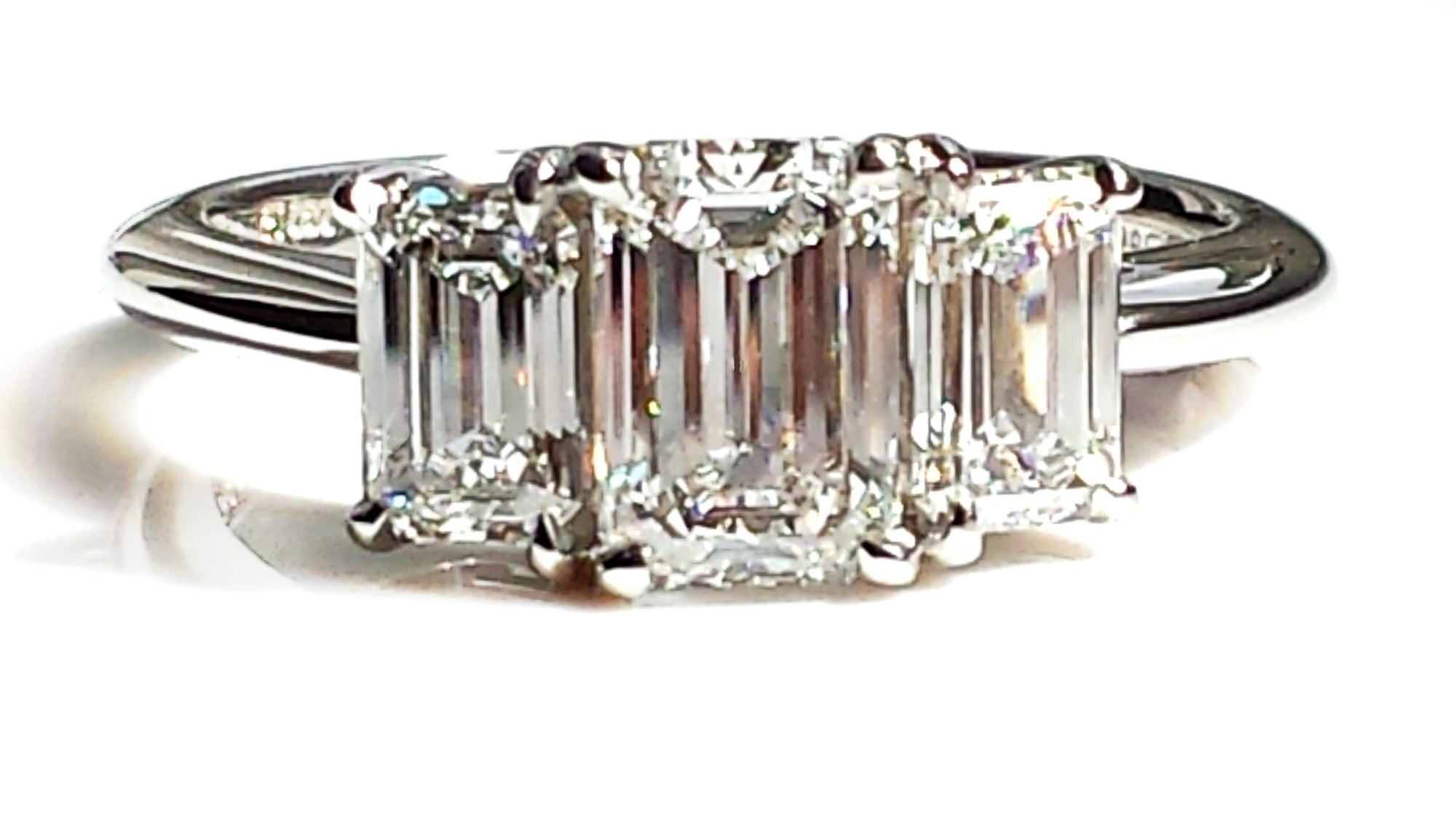 Tiffany & Co. 1.56ct E/VVS1 3-Stone Emerald Cut Diamond & Platinum Engagement Ring