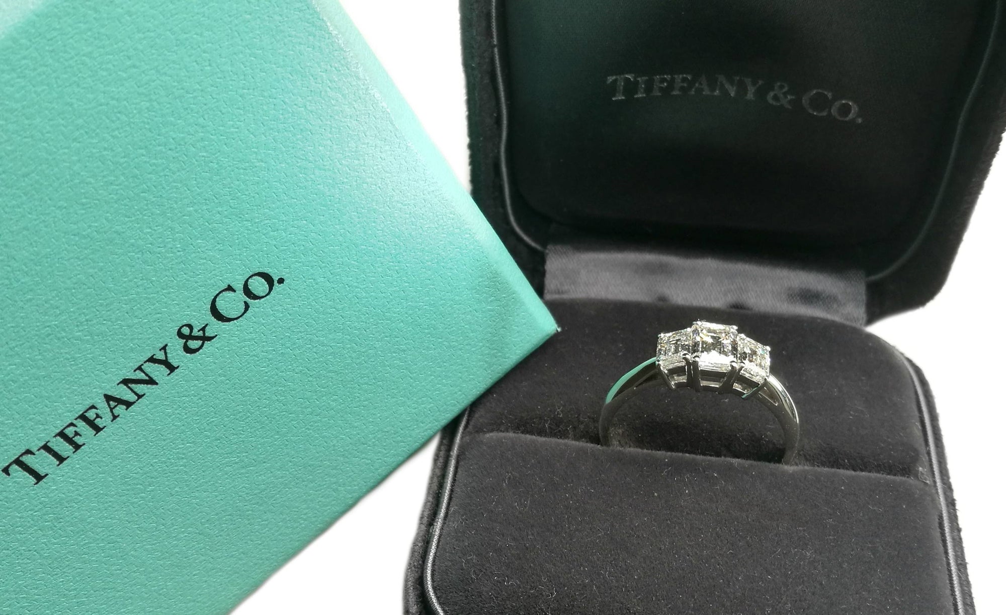Tiffany & Co. 1.70tcw Emerald Cut 3-Stone Diamond Engagement Ring in box