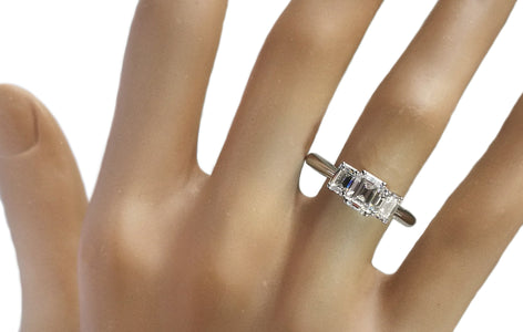 Tiffany & Co. 1.70tcw Emerald Cut 3-Stone Diamond Engagement Ring on finger