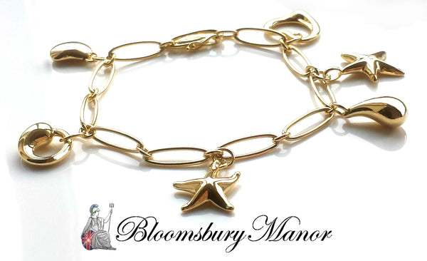 Charitybuzz: Elsa Peretti Tiffany & Co. 18k Gold Five Stone Charm Bracelet