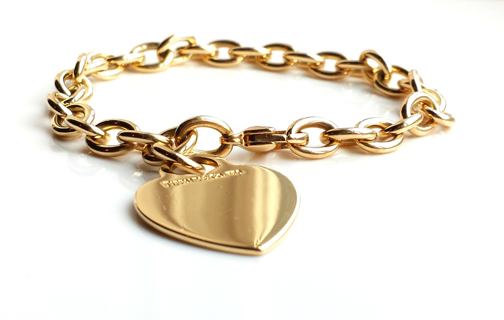 Tiffany & Co. 18k Gold Heart Tag Charm Bracelet, 7½ inches