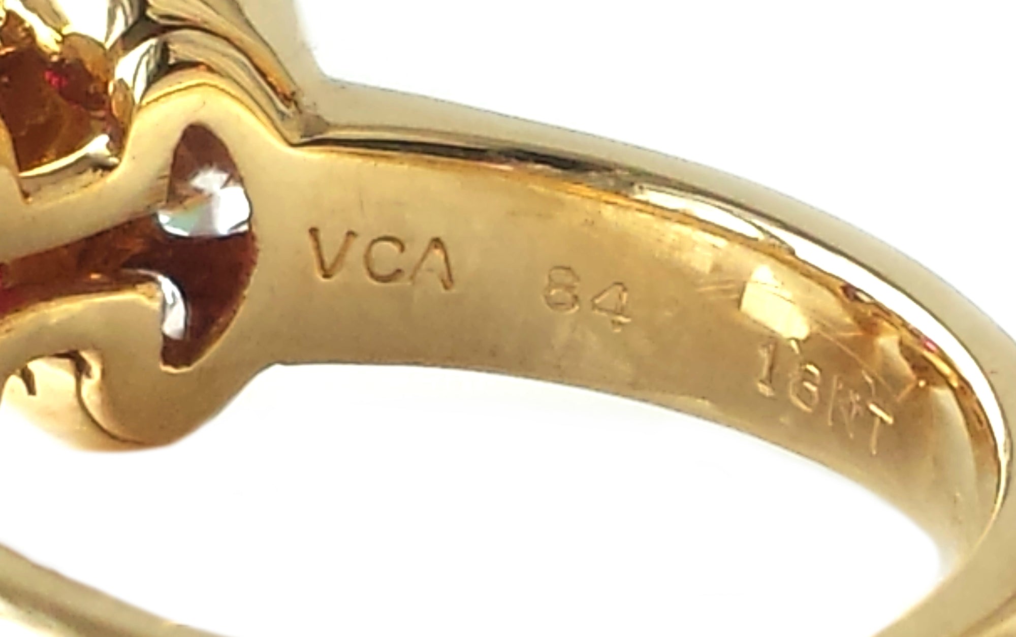 Van Cleef & Arpels 1980s Mystery Set™ Ruby & Diamond 18k Gold Bow Ring