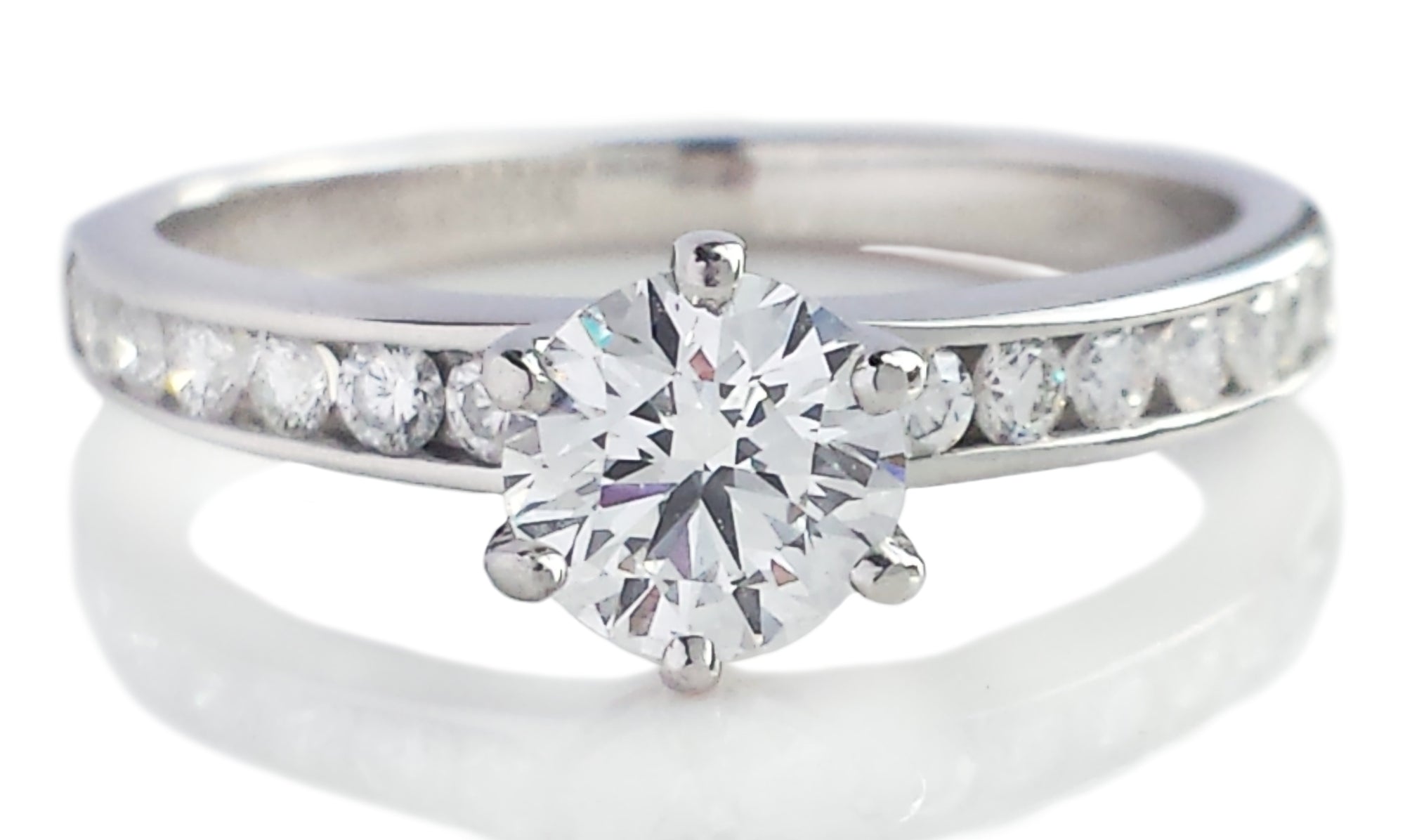 Tiffany & Co. 0.76tcw D/VS2 Round Brilliant Diamond Engagement Ring with Side Stones