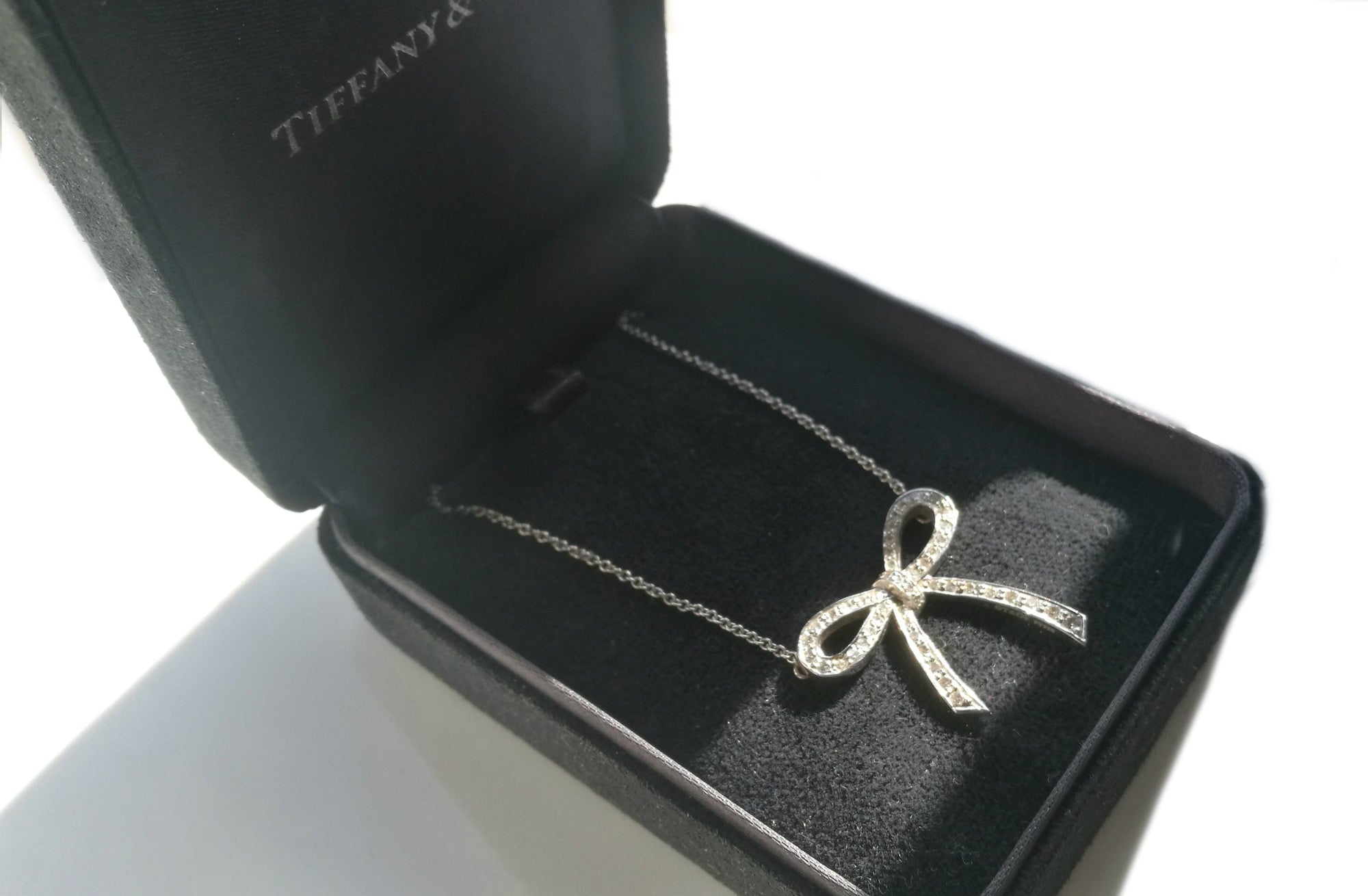 Tiffany & Co. 0.27ct Diamond & Platinum Bow Pendant / Necklace, RRP £3,450