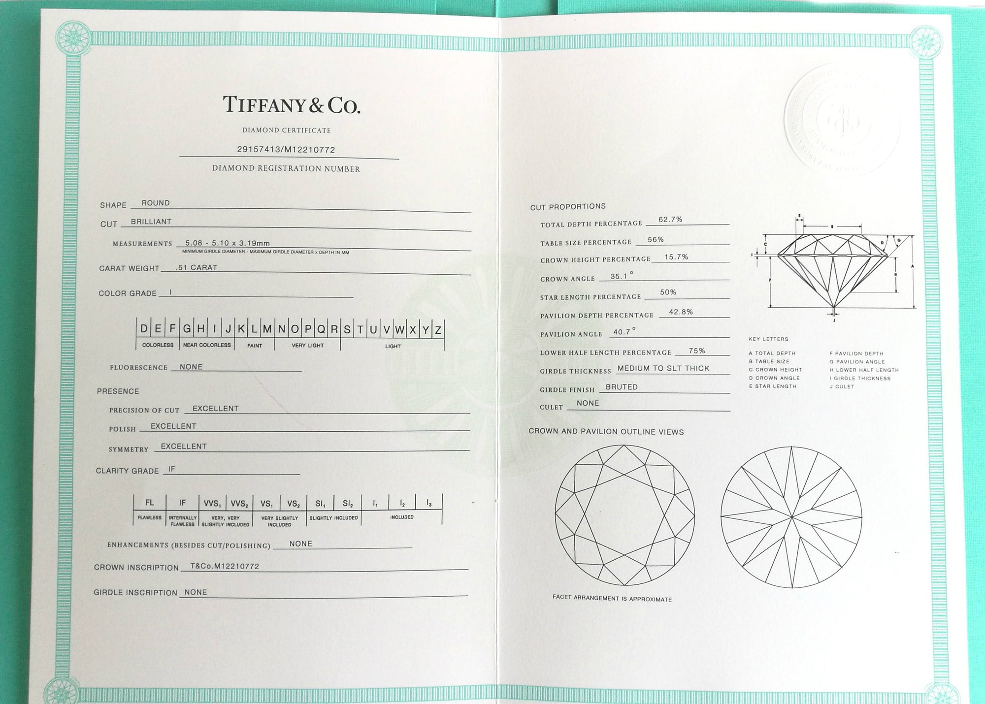 Tiffany & Co. 0.70tcw I/IF Triple XXX 'Embrace' Halo Set Diamond Engagement Ring Diamond Certificate