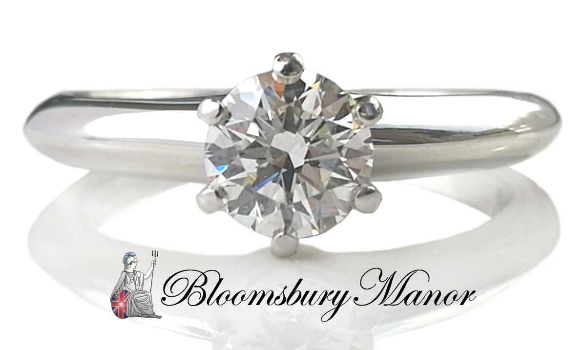 Tiffany & Co .56ct Round Brilliant Diamond Engagement Ring SZ J