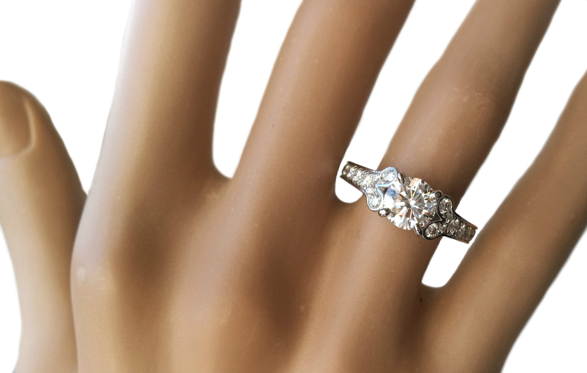 Cartier 1.18ct E/VVS1 Triple-X Ballerine Round Brilliant Diamond Engagement Ring on finger