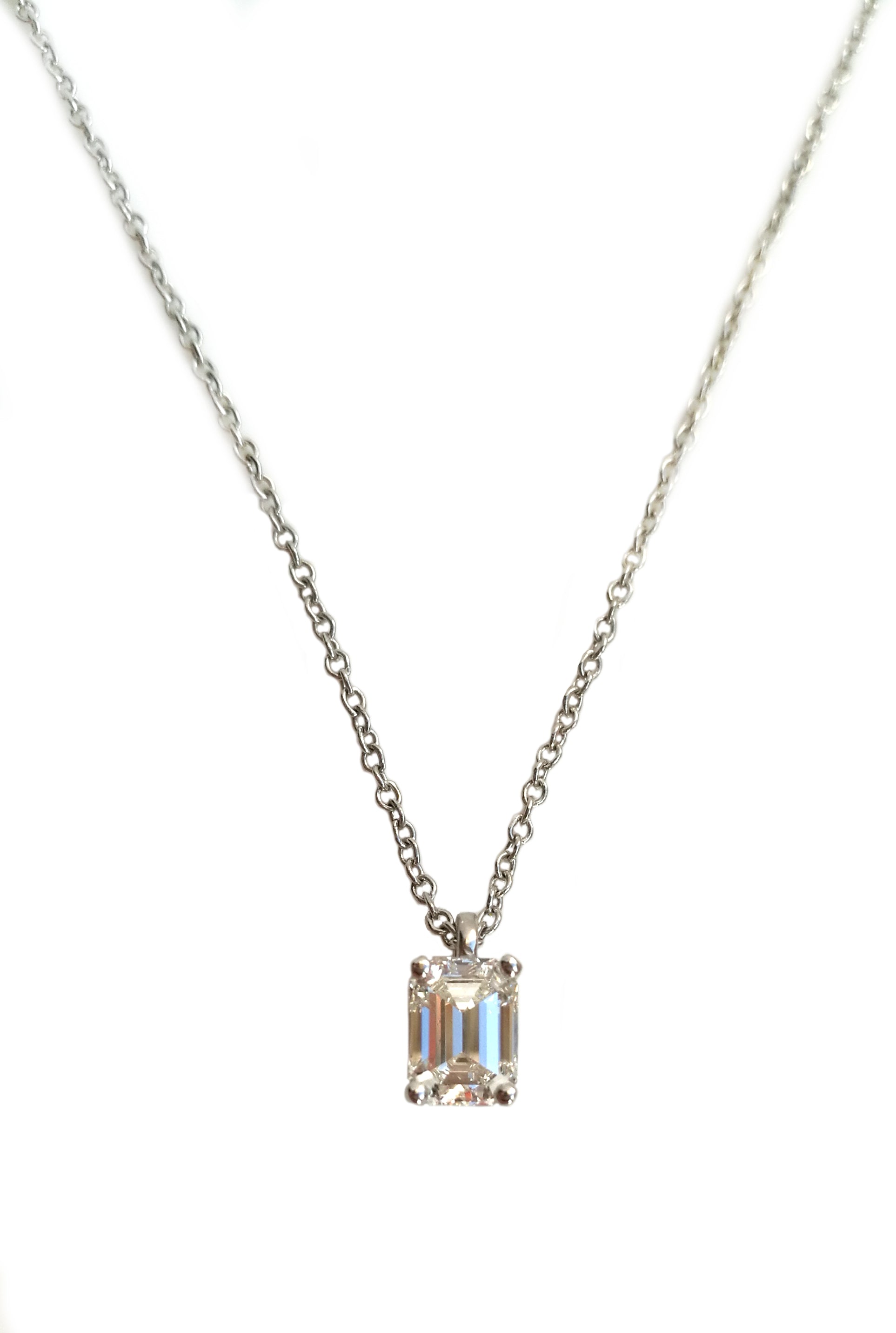 Tiffany & Co .59ct H/VVS1 Emerald Cut Diamond Pendant