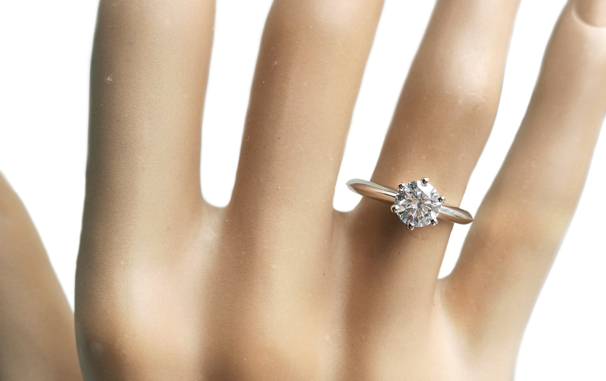 Tiffany & Co. 0.74ct F/VS1 Diamond Engagement Ring on finger