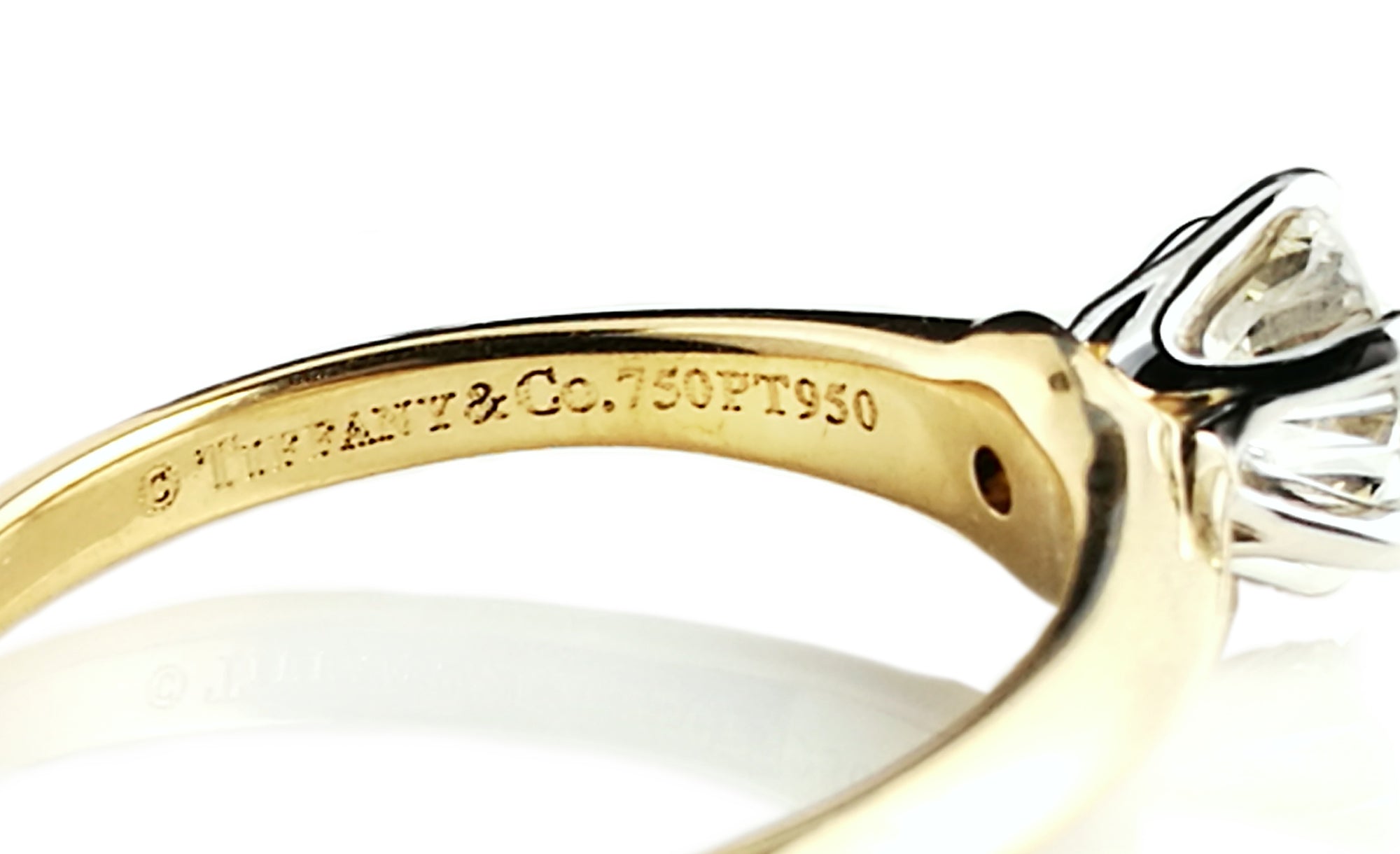 Tiffany & Co. 0.63ct H/VS Round Brilliant Diamond & 18K Gold Engagement Ring