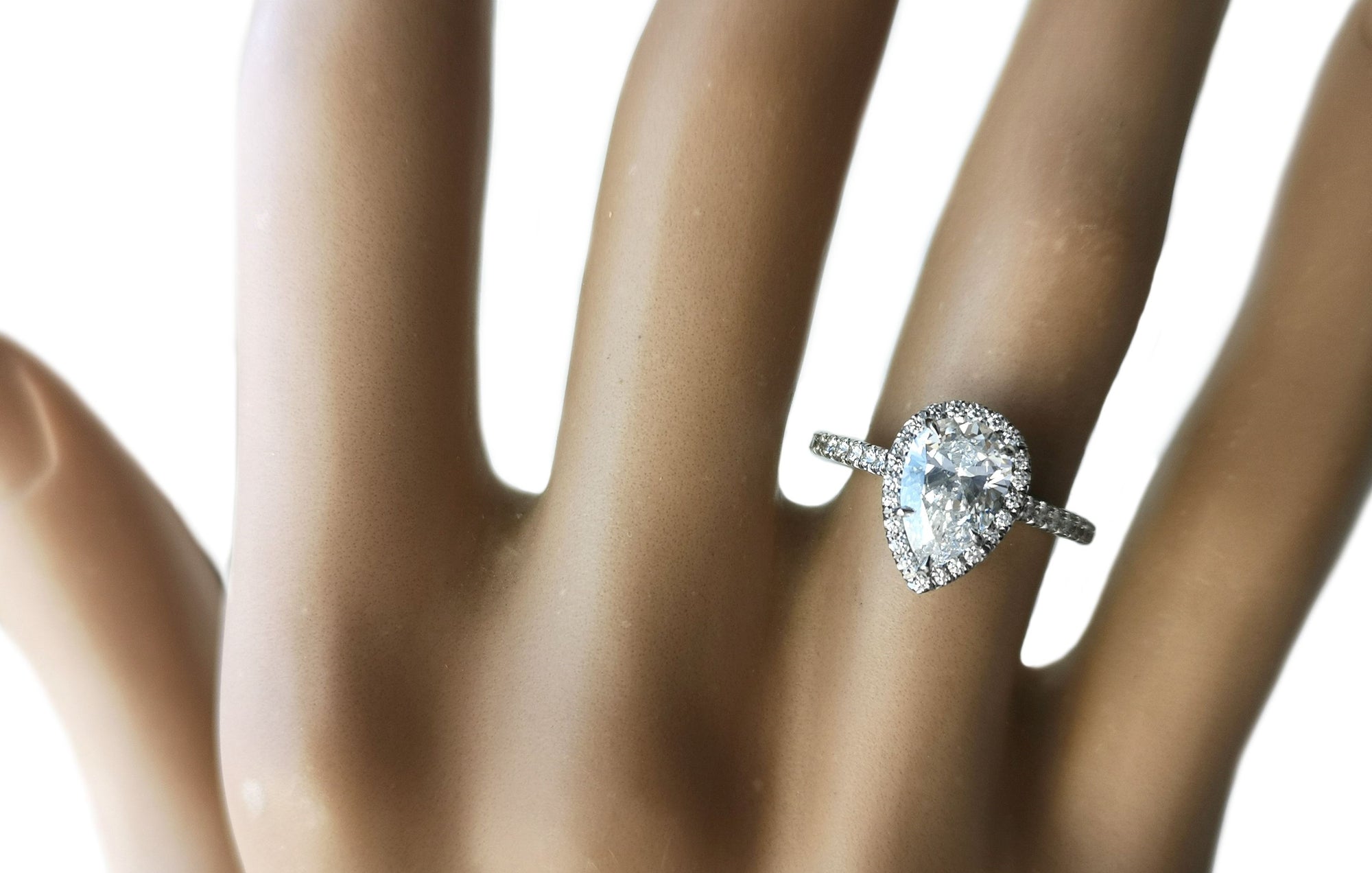 Tiffany & Co. 1.03ct E/VS1 Pear Shaped Soleste Diamond Engagement Ring on finger