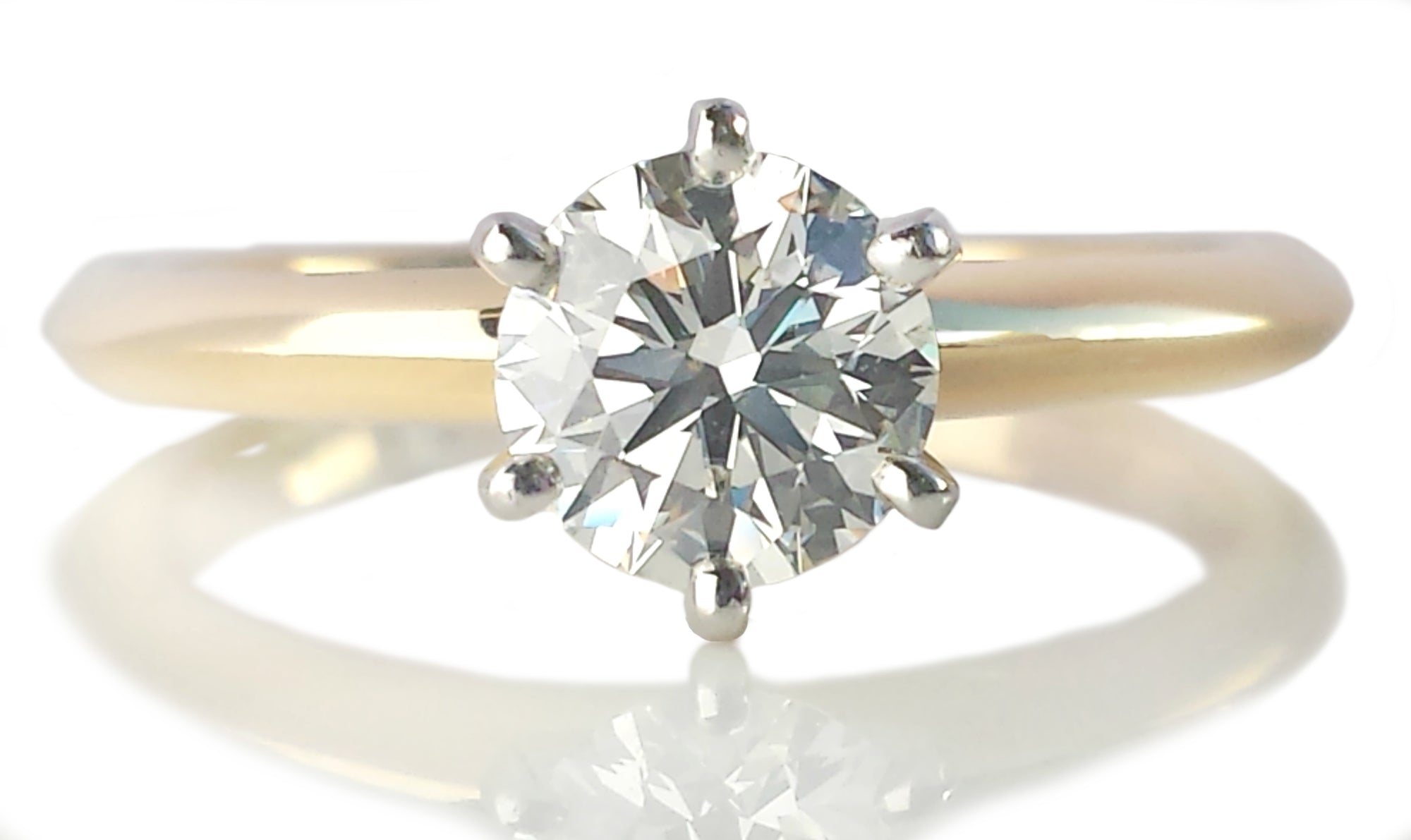 Tiffany & Co. 0.73 H/VVS2 Round Brilliant Diamond & 18K Yellow Gold Engagement Ring