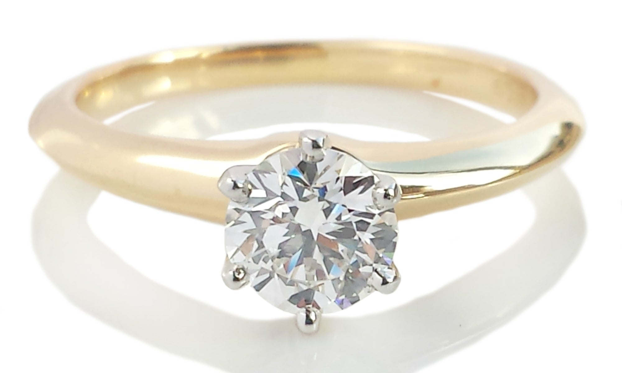 Tiffany & Co. 0.70ct H/VS1 Triple XXX Round Brilliant Diamond & 18K Gold Engagement Ring