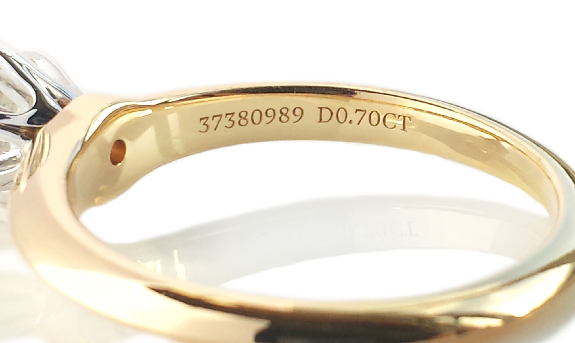 Tiffany & Co. 0.70ct H/VS1 Triple XXX Round Brilliant Diamond & 18K Gold Engagement Ring