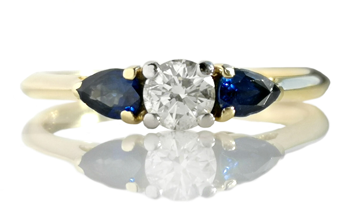 Tiffany & Co .27ct Round Brilliant Diamond & .41tcw Pear Cut Sapphire Engagement Ring
