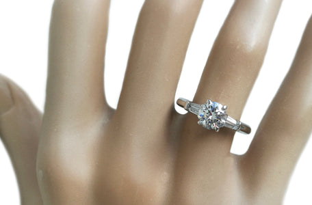 Tiffany & Co. 1.17ct G/VS1 3 Stone Diamond Engagement Ring with Baguette Side Stones on finger